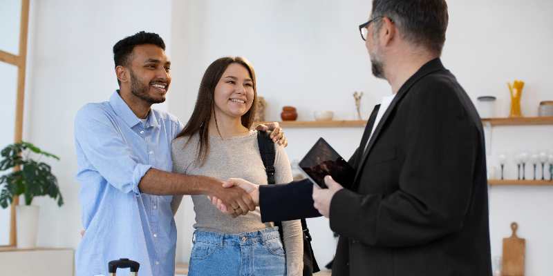 guests host smiling